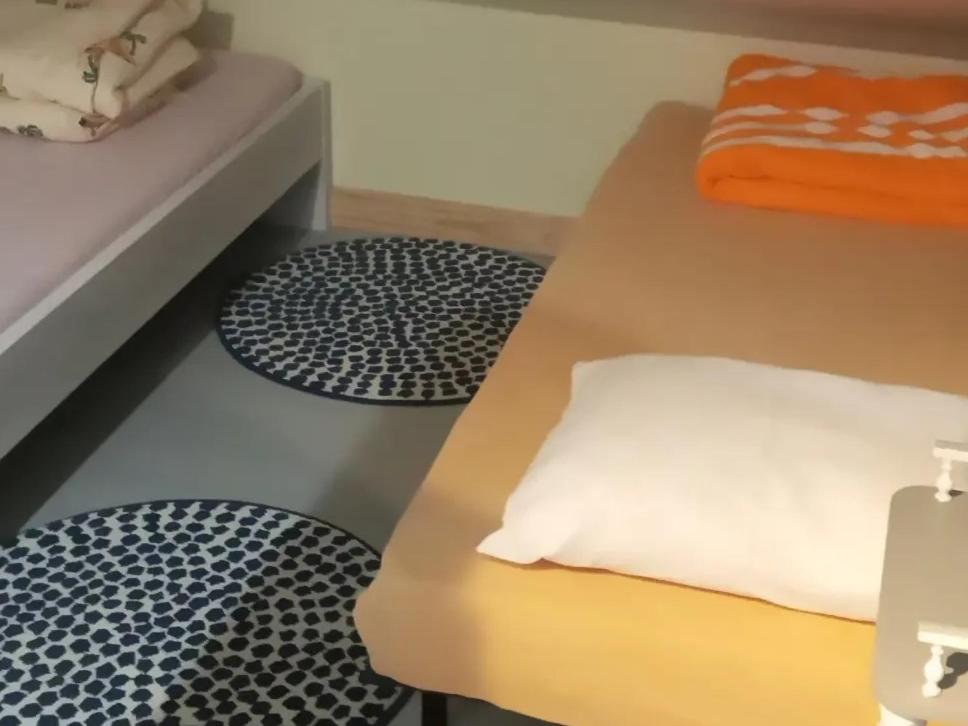 Postel nebo postele na pokoji v ubytování Le Relais De Rochepaule