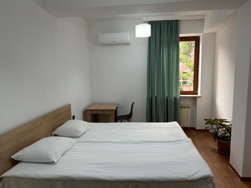 Postel nebo postele na pokoji v ubytování One Day Hostel