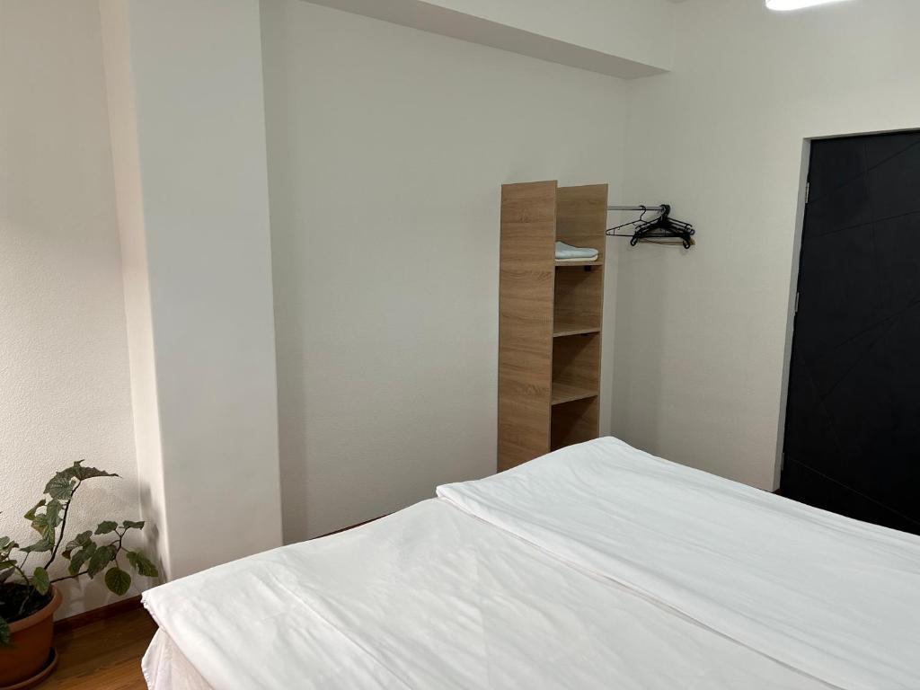 Postel nebo postele na pokoji v ubytování One Day Hostel