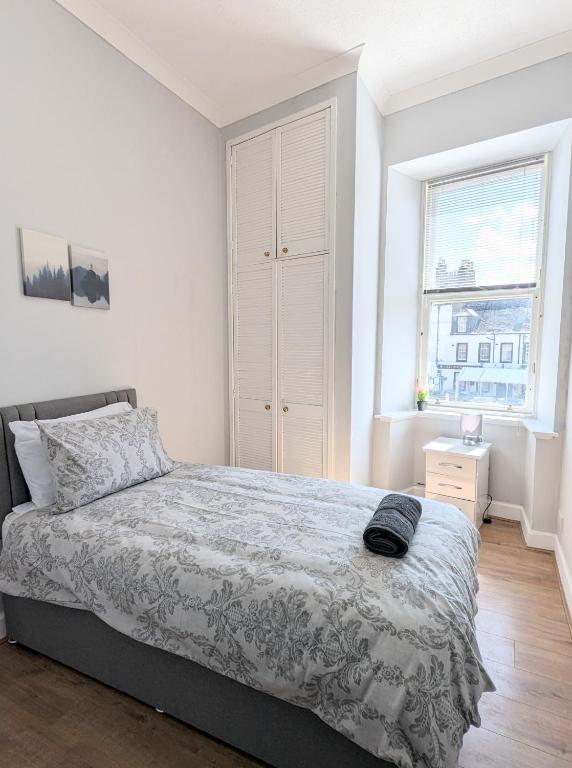 Postel nebo postele na pokoji v ubytování Campbeltown Central