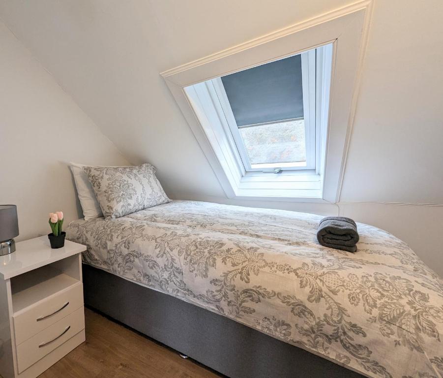 Postel nebo postele na pokoji v ubytování Campbeltown Central