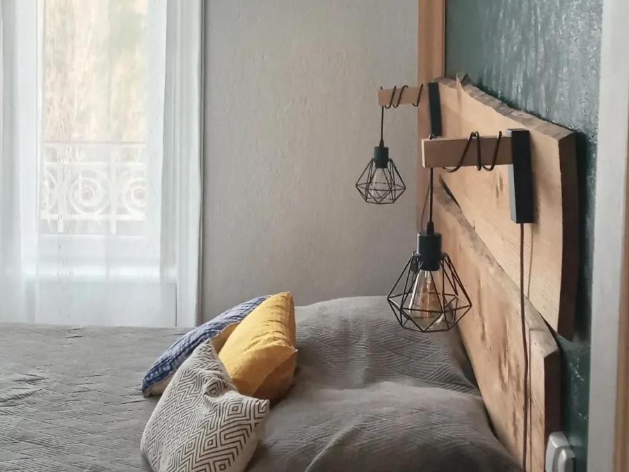Postel nebo postele na pokoji v ubytování Le Relais De Rochepaule