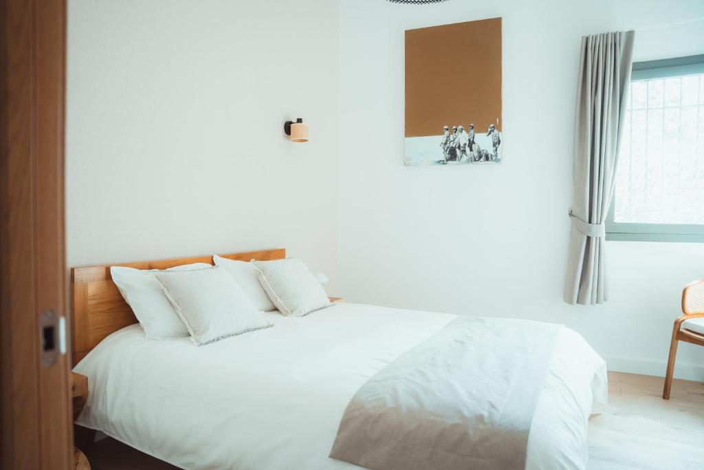 Postel nebo postele na pokoji v ubytování Maison Balas