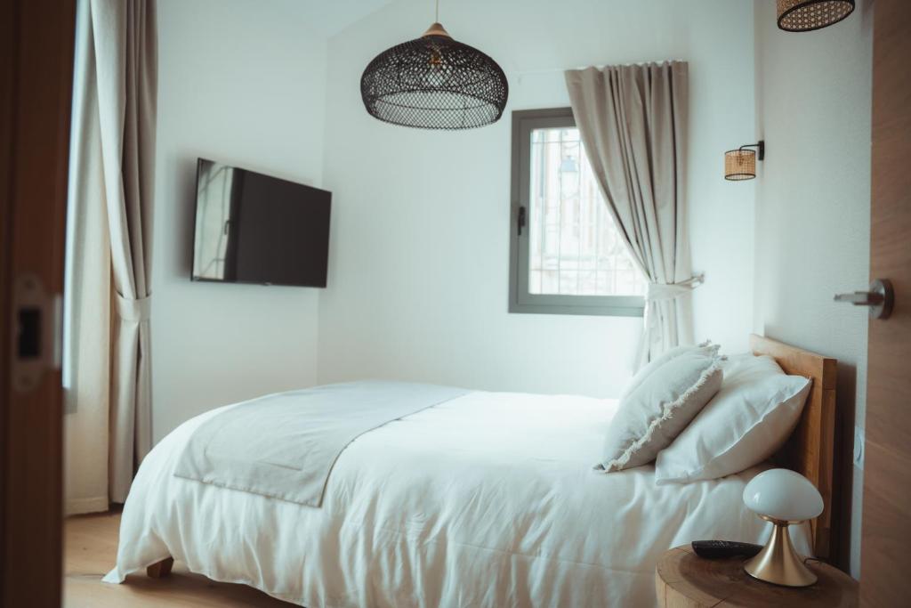 Postel nebo postele na pokoji v ubytování Maison Balas