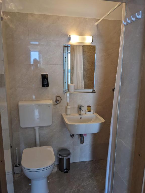 Koupelna v ubytování Appa Apartments