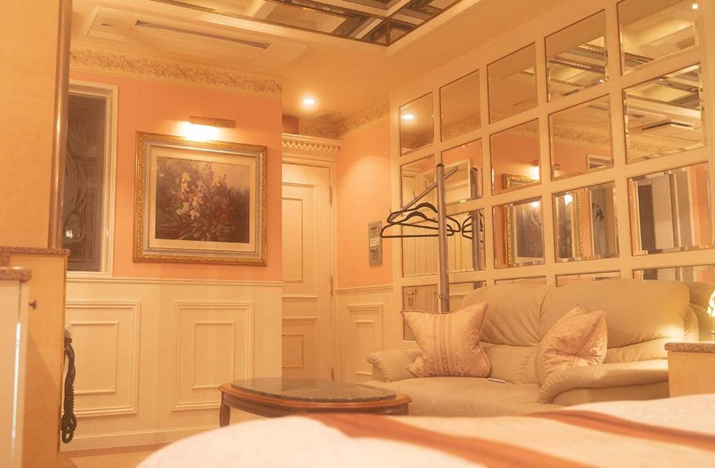 Postel nebo postele na pokoji v ubytování Hotel Dion ホテル ディオン - Adult Only