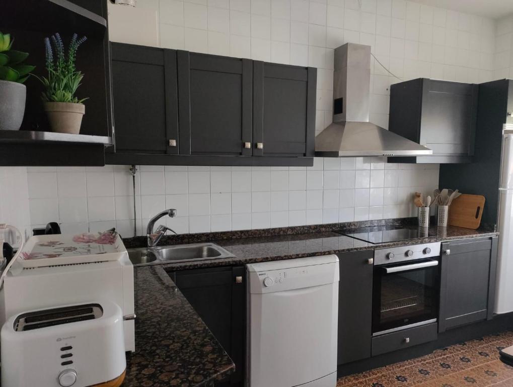 Kuchyň nebo kuchyňský kout v ubytování Vivienda Verano
