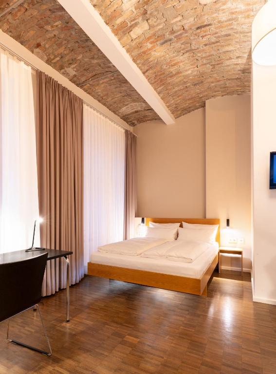 Postel nebo postele na pokoji v ubytování Hotel Johann