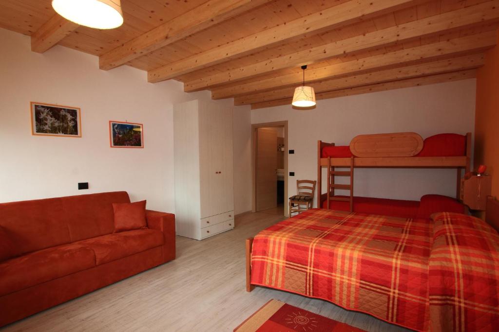 Postel nebo postele na pokoji v ubytování Agriturismo Val Codera