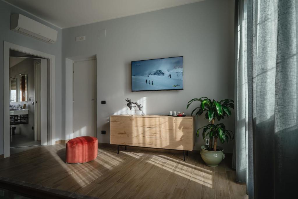 TV a/nebo společenská místnost v ubytování B&B La Perla