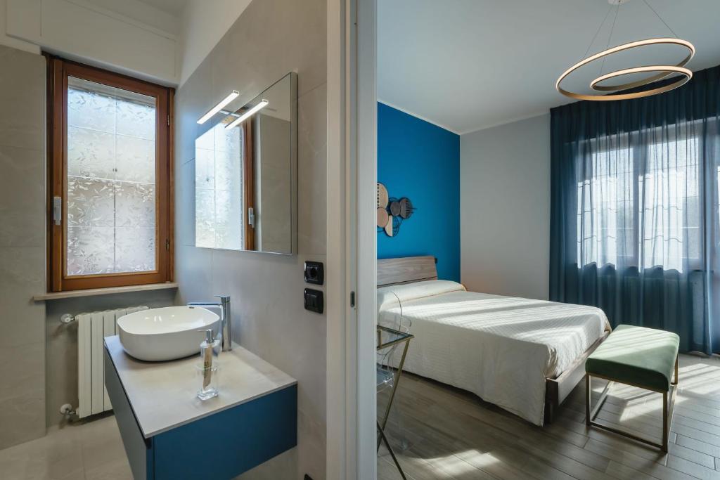 Postel nebo postele na pokoji v ubytování B&B La Perla