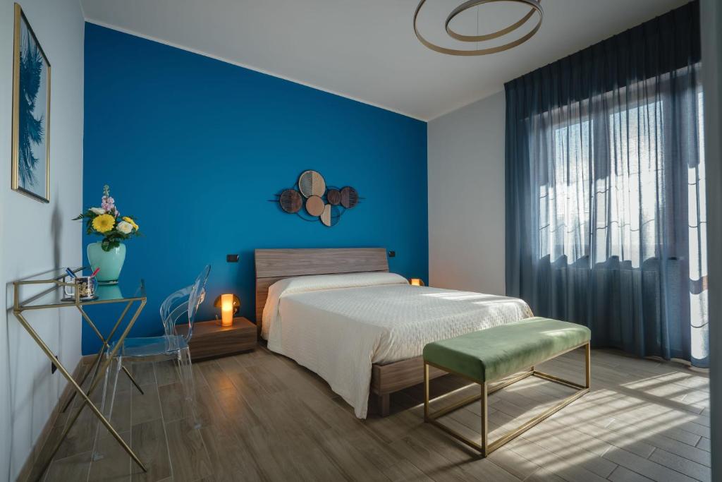 Postel nebo postele na pokoji v ubytování B&B La Perla