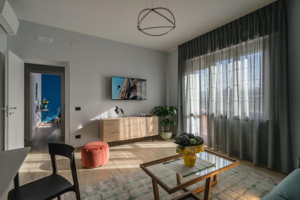 TV a/nebo společenská místnost v ubytování B&B La Perla