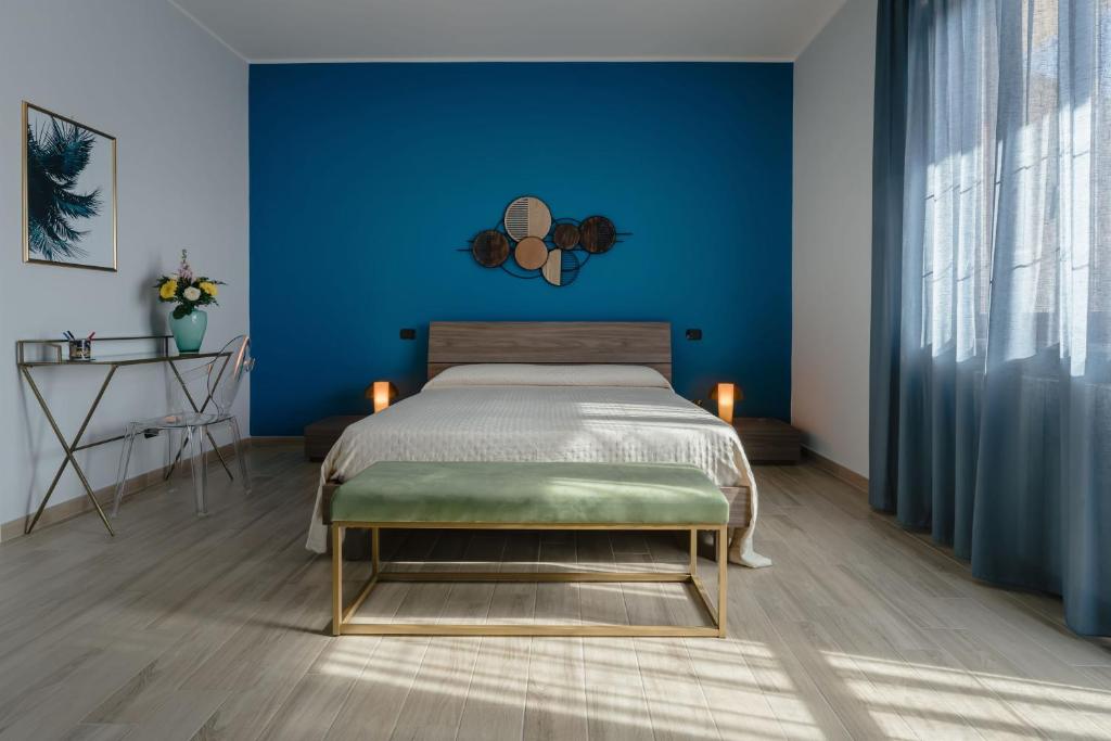 Postel nebo postele na pokoji v ubytování B&B La Perla