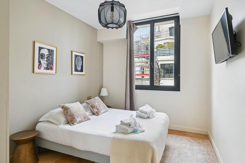 Posteľ alebo postele v izbe v ubytovaní 293 Suite Arc de Triomphe - Superb apartment