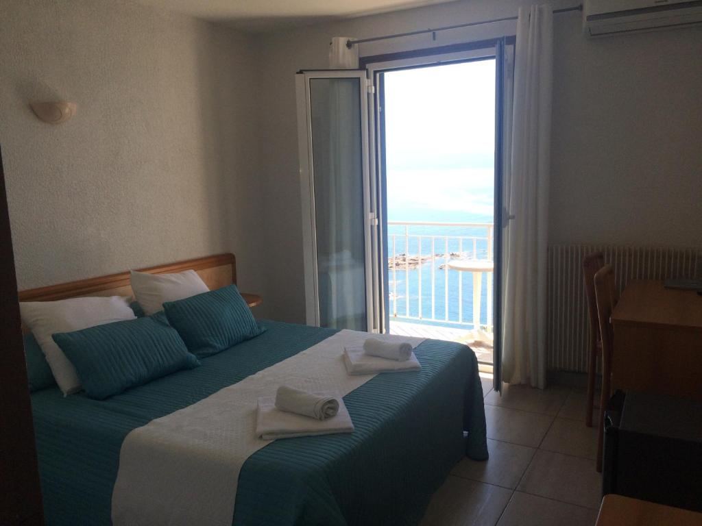 Postel nebo postele na pokoji v ubytování Bel Mare