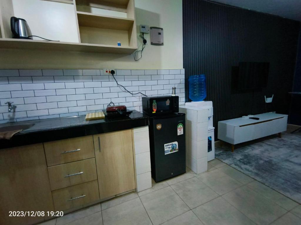 Kuchyň nebo kuchyňský kout v ubytování Kigemti Home