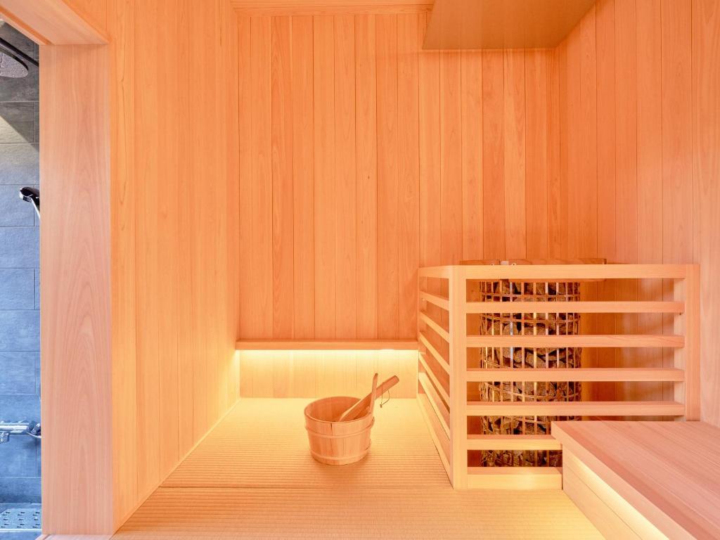 Postel nebo postele na pokoji v ubytování KONJAKUSO Nara Naramachi "MUSHIBUROYA" Sauna Villa