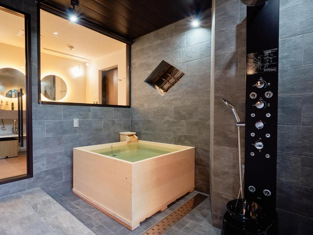 Koupelna v ubytování KONJAKUSO Nara Naramachi "MUSHIBUROYA" Sauna Villa