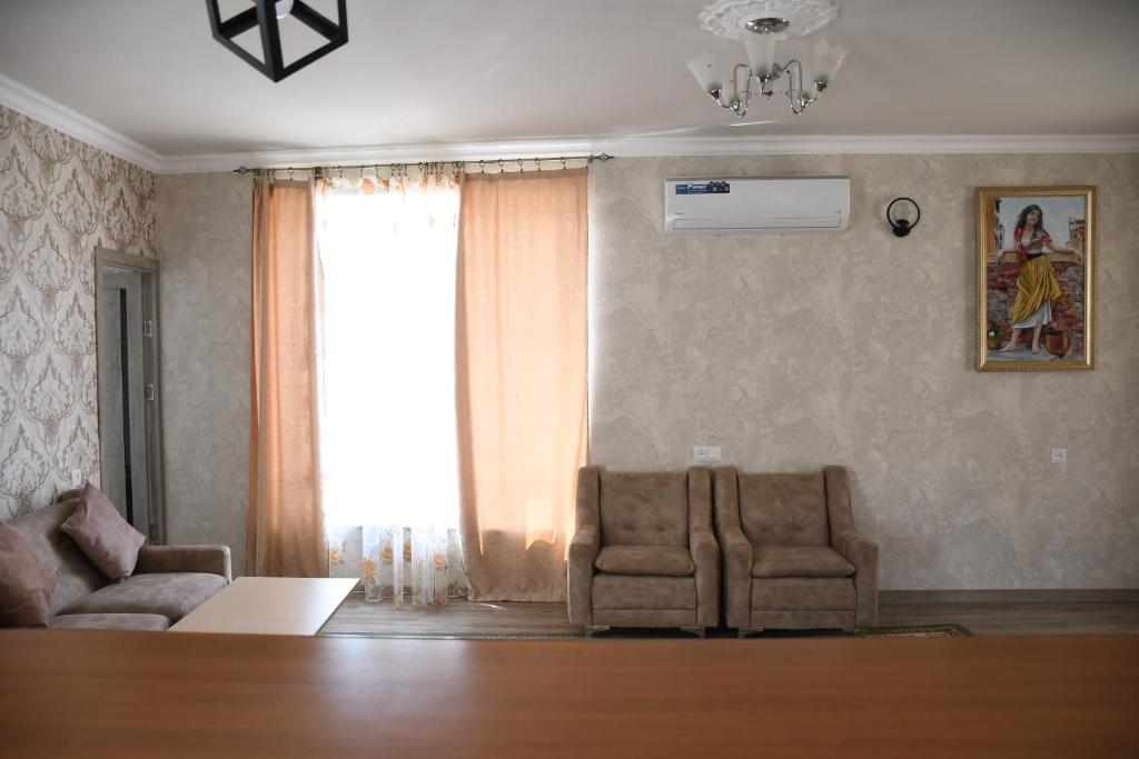 Posezení v ubytování Armani Guest house