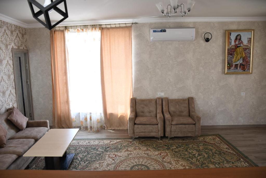 Posezení v ubytování Armani Guest house