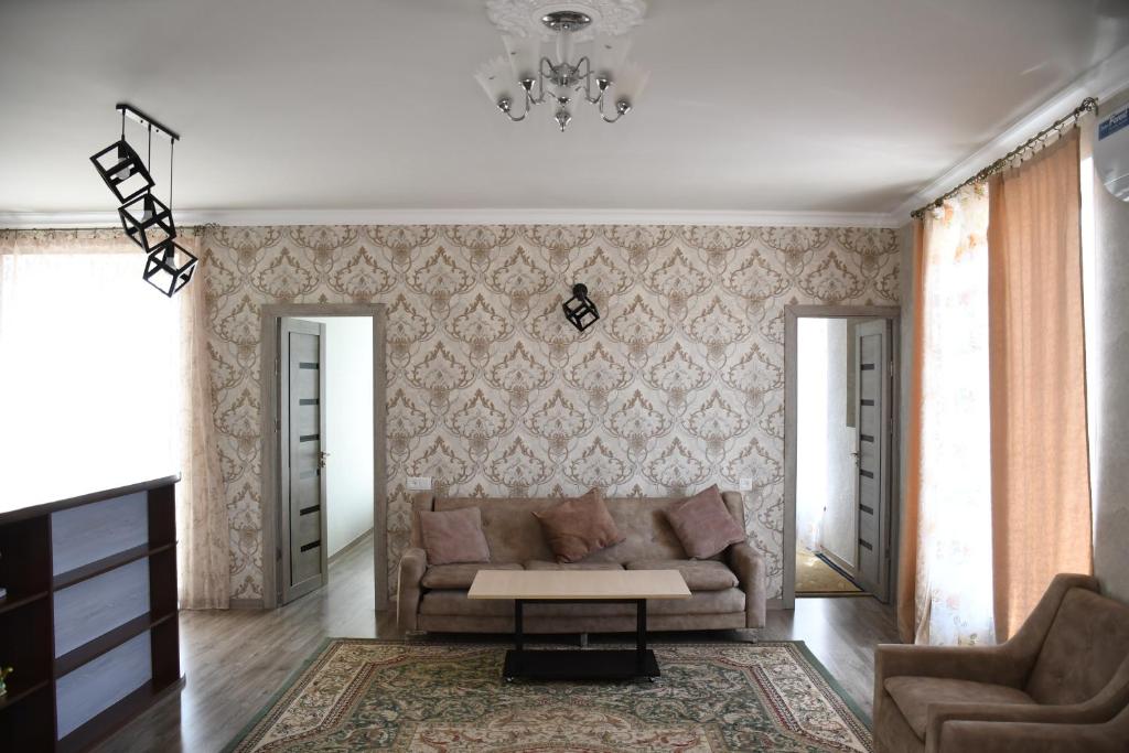 Posezení v ubytování Armani Guest house