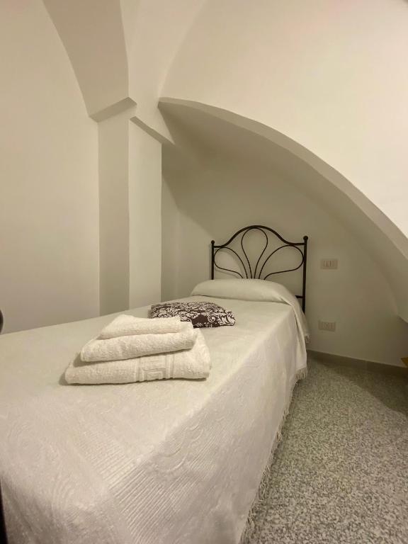 Postel nebo postele na pokoji v ubytování Terra D`Itria