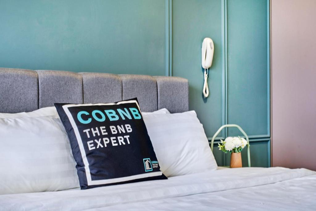 Postel nebo postele na pokoji v ubytování Continew Residence KL CoBNB