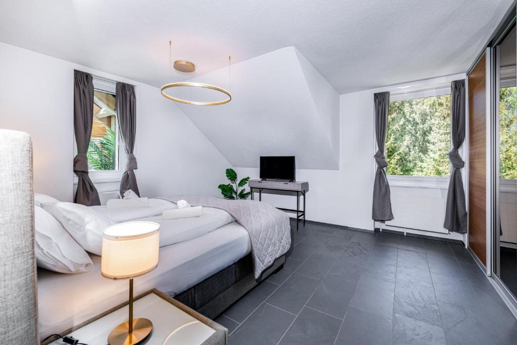 Postel nebo postele na pokoji v ubytování EH Apartments Uranus mit privater Sauna