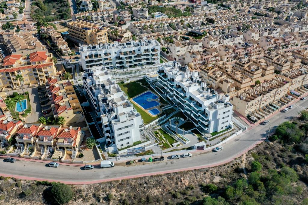 an aerial view of a city with buildings at The Aire Residencial by Mar Holidays in Orihuela