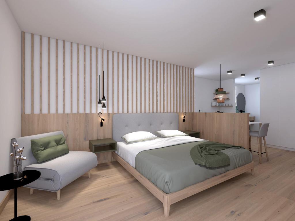 Postel nebo postele na pokoji v ubytování Stricker Aparthotel