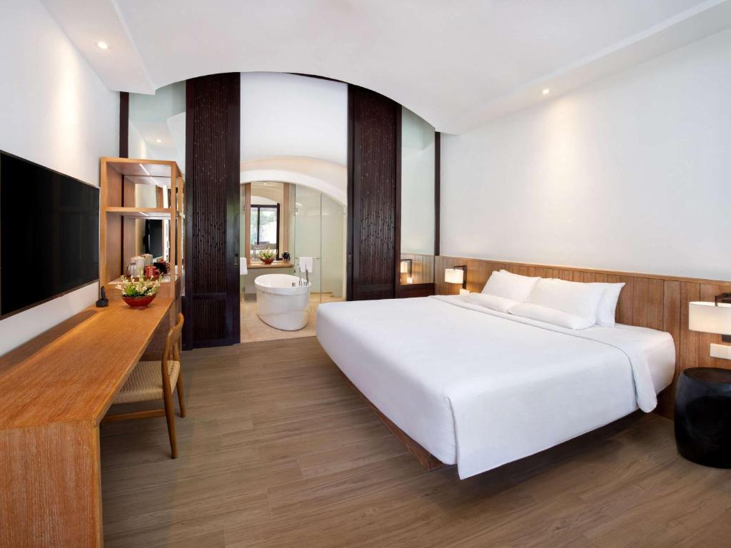 Postel nebo postele na pokoji v ubytování Novotel Bali Benoa