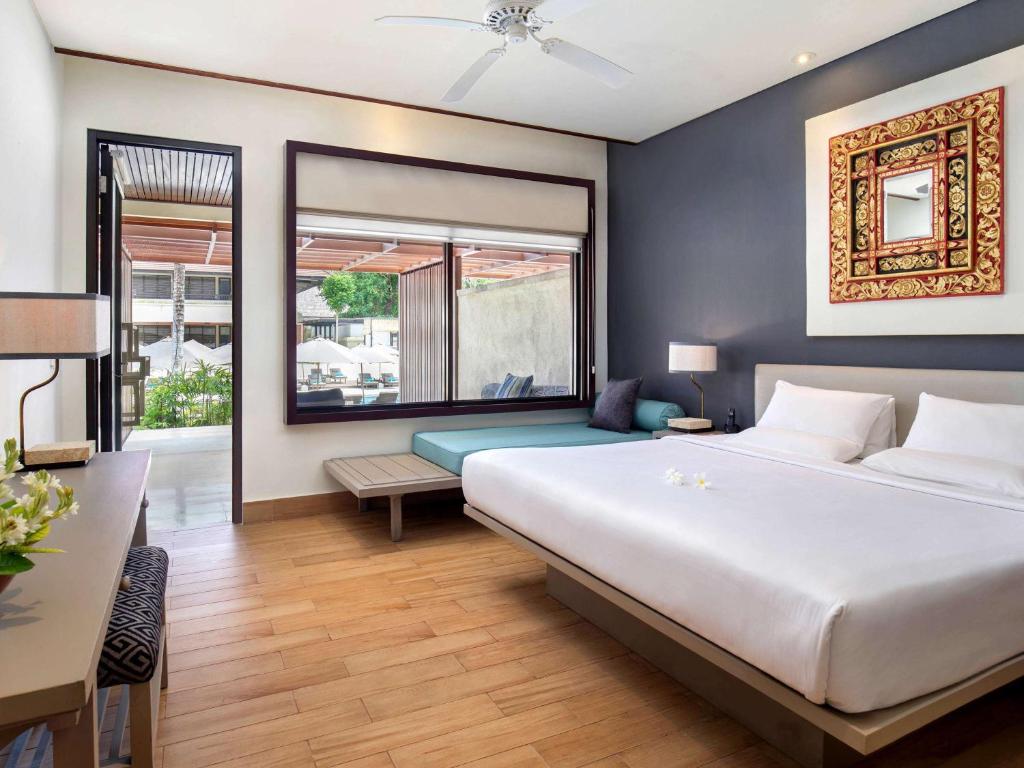Postel nebo postele na pokoji v ubytování Novotel Bali Benoa