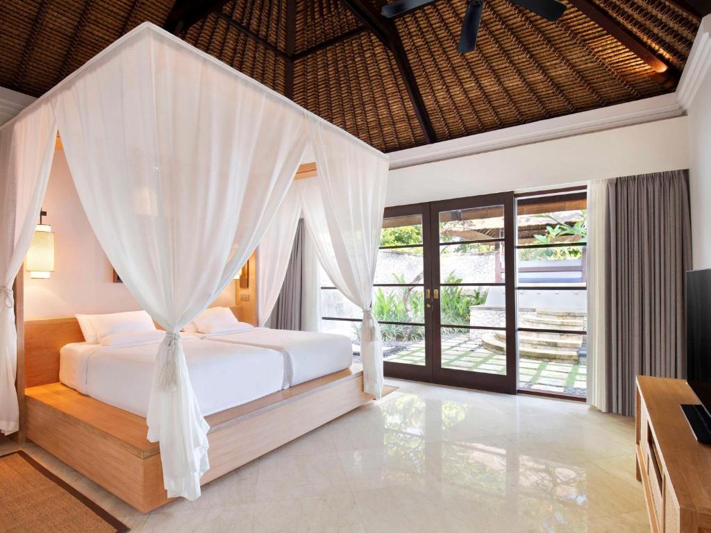 Postel nebo postele na pokoji v ubytování Novotel Bali Benoa