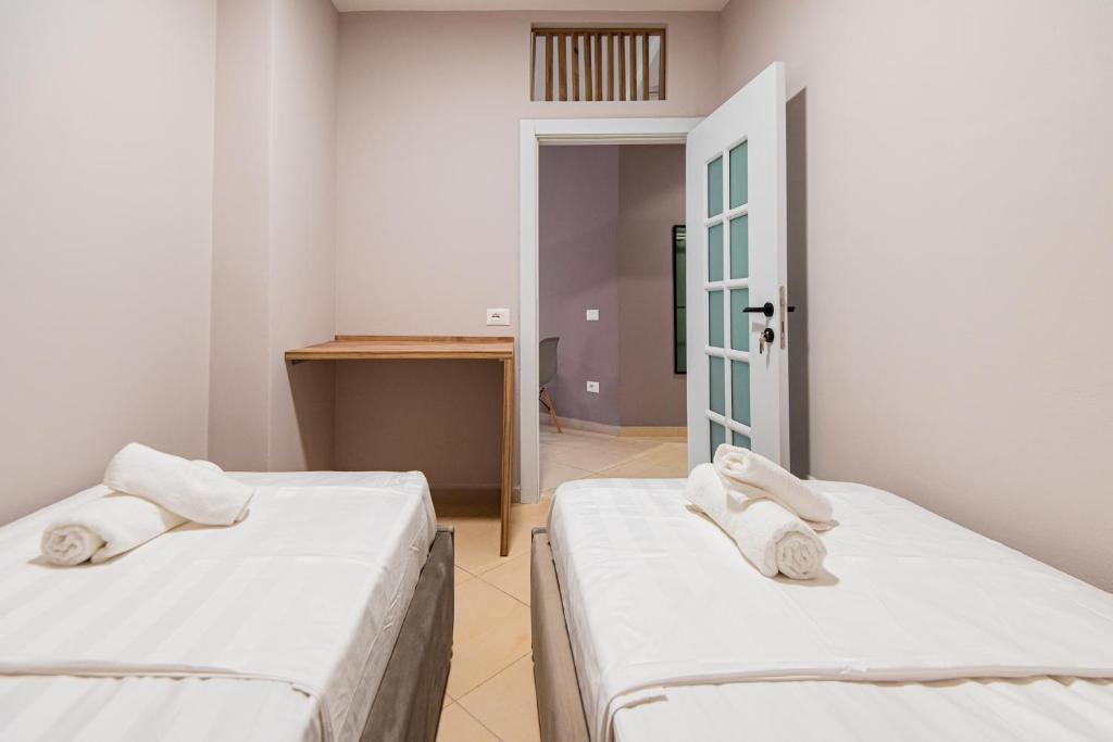 Postel nebo postele na pokoji v ubytování ApartHotel EDA