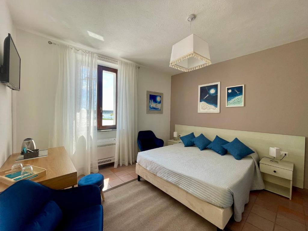 Ένα ή περισσότερα κρεβάτια σε δωμάτιο στο Antea Rooms