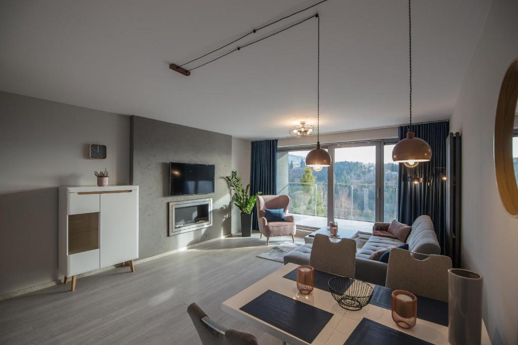 Posezení v ubytování Bukowa Apartment with Parking and Mountain View in Wisła by Noclegi Renters