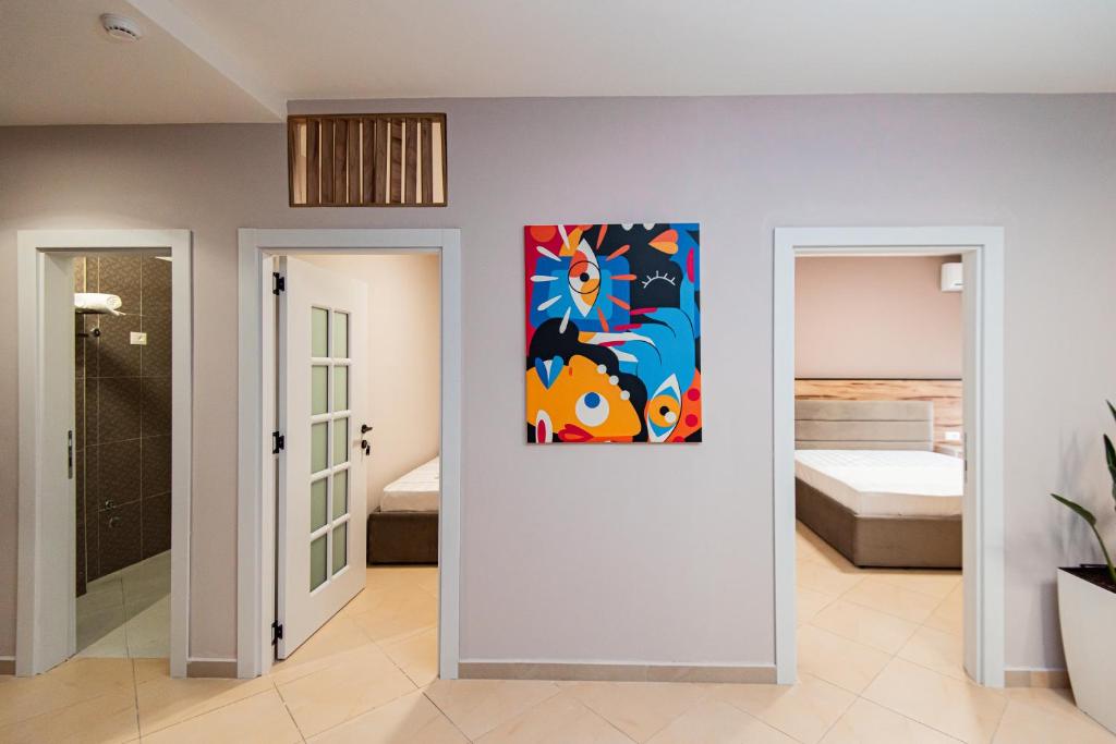 Postel nebo postele na pokoji v ubytování ApartHotel EDA