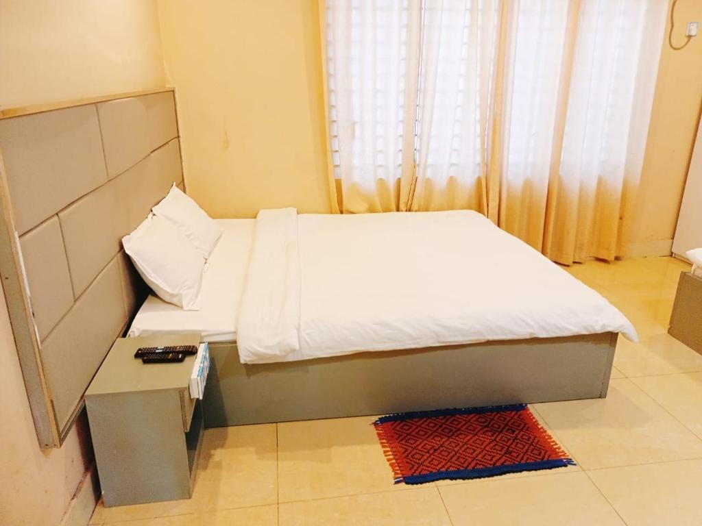 Voodi või voodid majutusasutuse Hotel Grand Usman toas