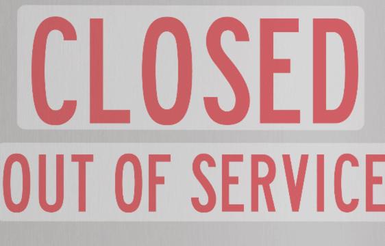 two signs that say closed out of service at Juanito place in Palma de Mallorca