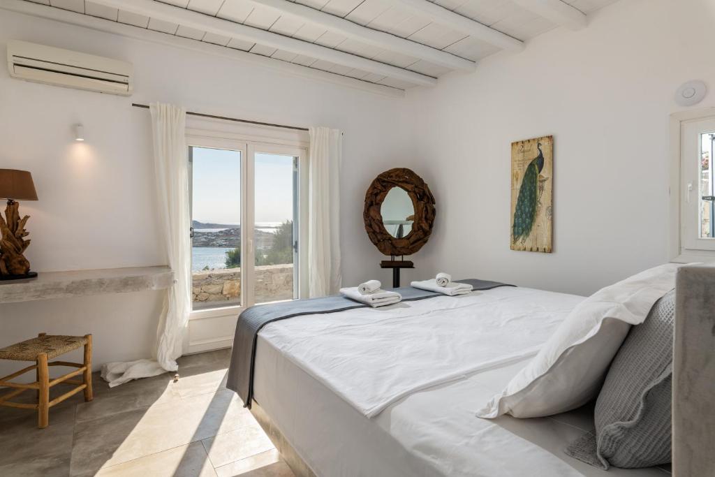 Postel nebo postele na pokoji v ubytování Villa Ava Mykonos