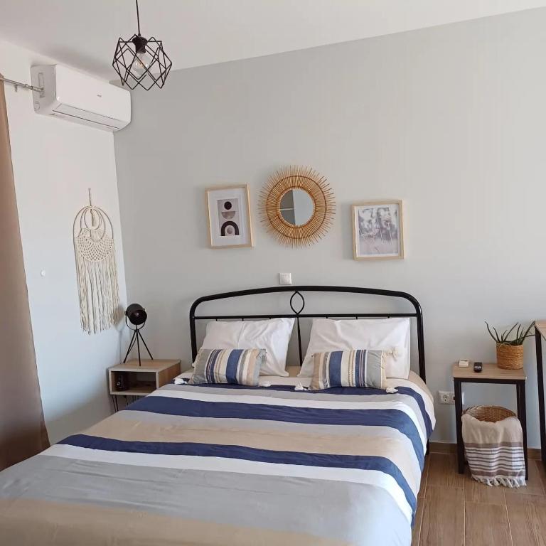 Posteľ alebo postele v izbe v ubytovaní Asterias blue Studio