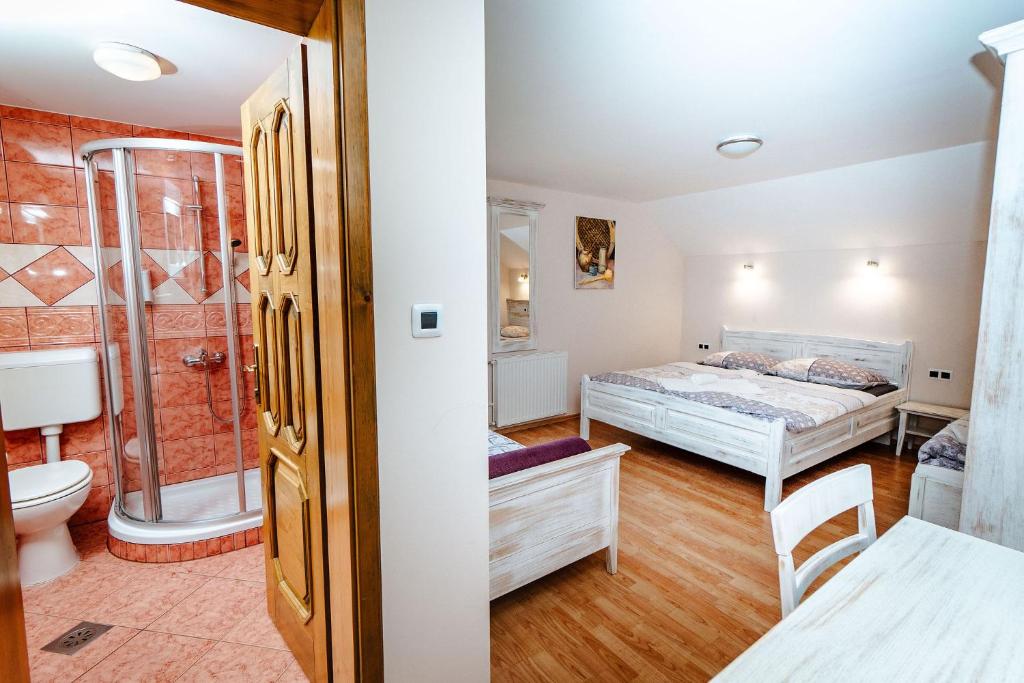 Postel nebo postele na pokoji v ubytování Zelena Oaza - B&B