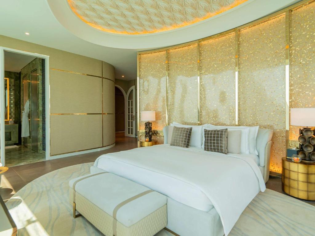 Letto o letti in una camera di Raffles Doha