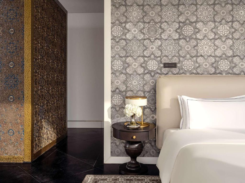 Letto o letti in una camera di Raffles Doha