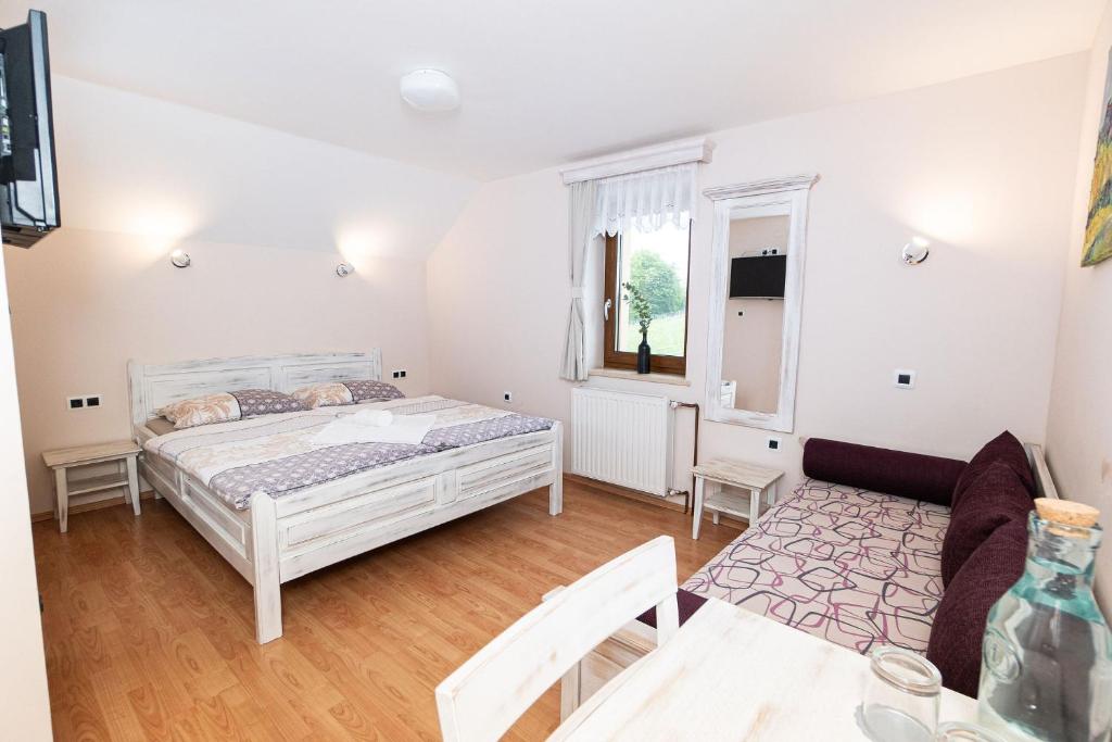 Postel nebo postele na pokoji v ubytování Zelena Oaza - B&B