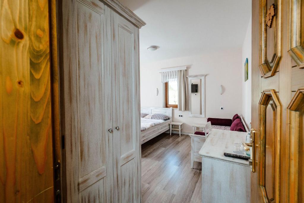 Postel nebo postele na pokoji v ubytování Zelena Oaza - B&B