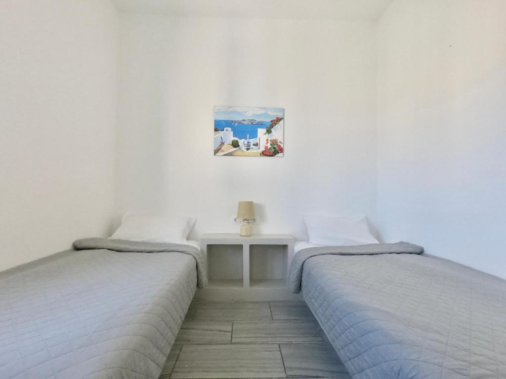 Ένα ή περισσότερα κρεβάτια σε δωμάτιο στο Anny Studios & Rooms Perissa Beach