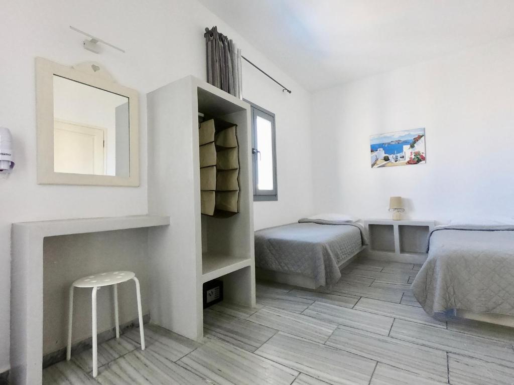 Ένα ή περισσότερα κρεβάτια σε δωμάτιο στο Anny Studios & Rooms Perissa Beach