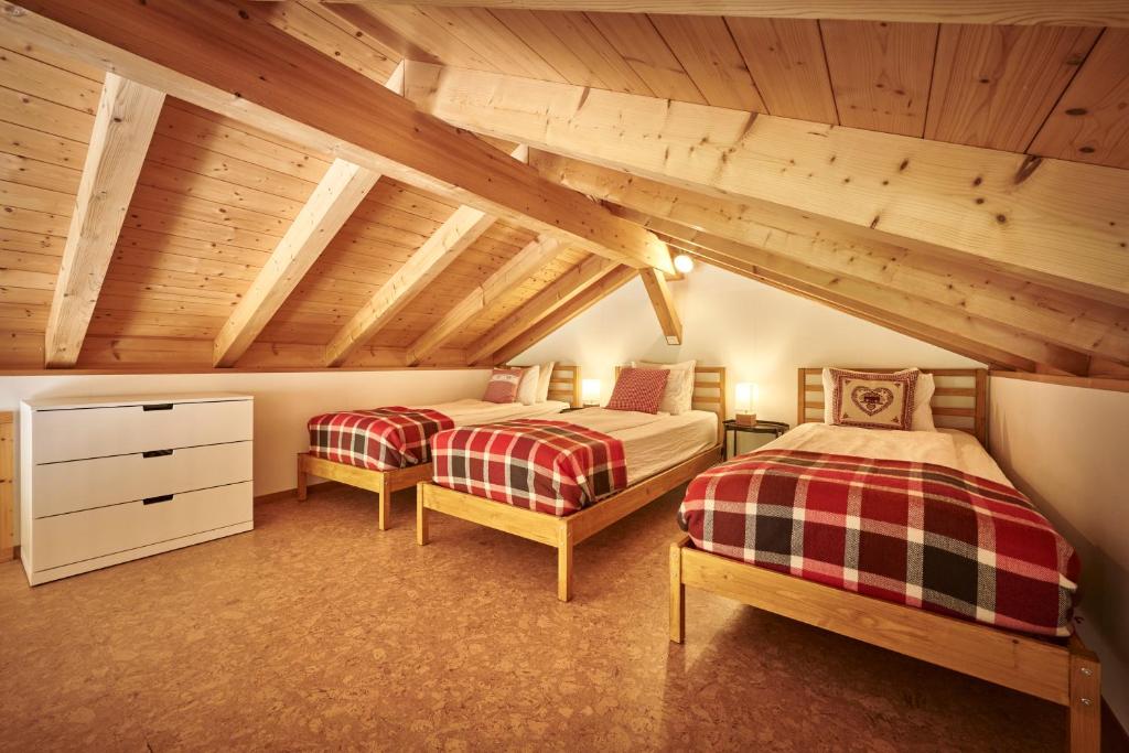 Postel nebo postele na pokoji v ubytování Chalet Lauterbrunnen